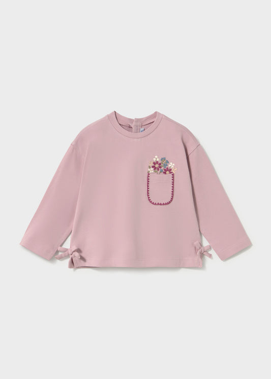 Maglietta bambina Mayoral malva con taschino fiorito e fiocchetti