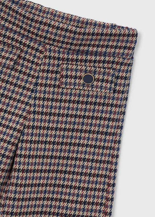 Dettaglio della finta tasca con bottone del pantalone pied-de-poule Mayoral