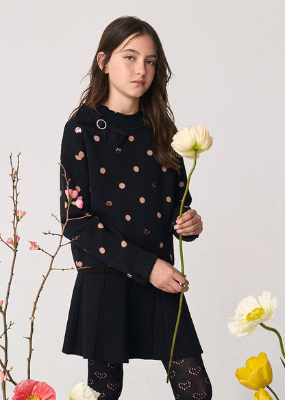 Compl. gonna tricot pois