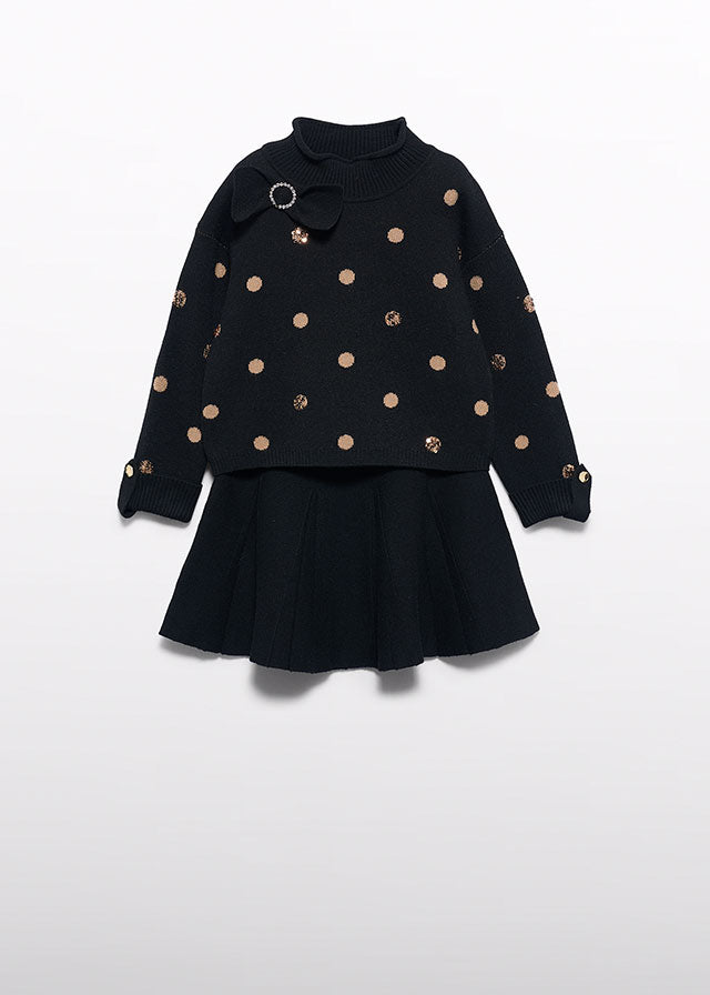 Compl. gonna tricot pois