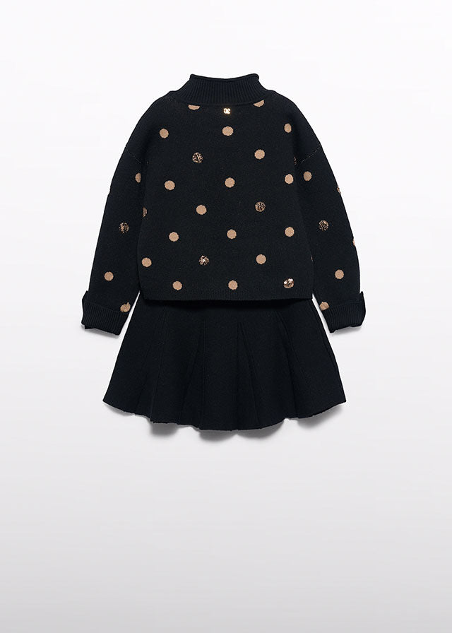 Compl. gonna tricot pois