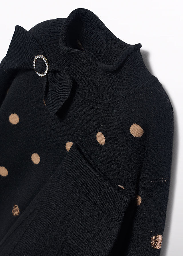 Compl. gonna tricot pois