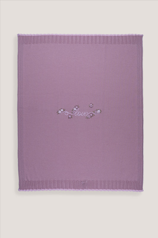 Copertina neonata Marlù in maglia color marsala con decoro ricamato